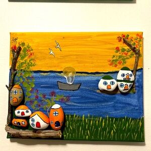 Art whith stones, wood and paint